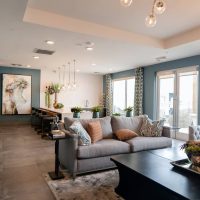 black-wooden-coffee-table-near-white-couch